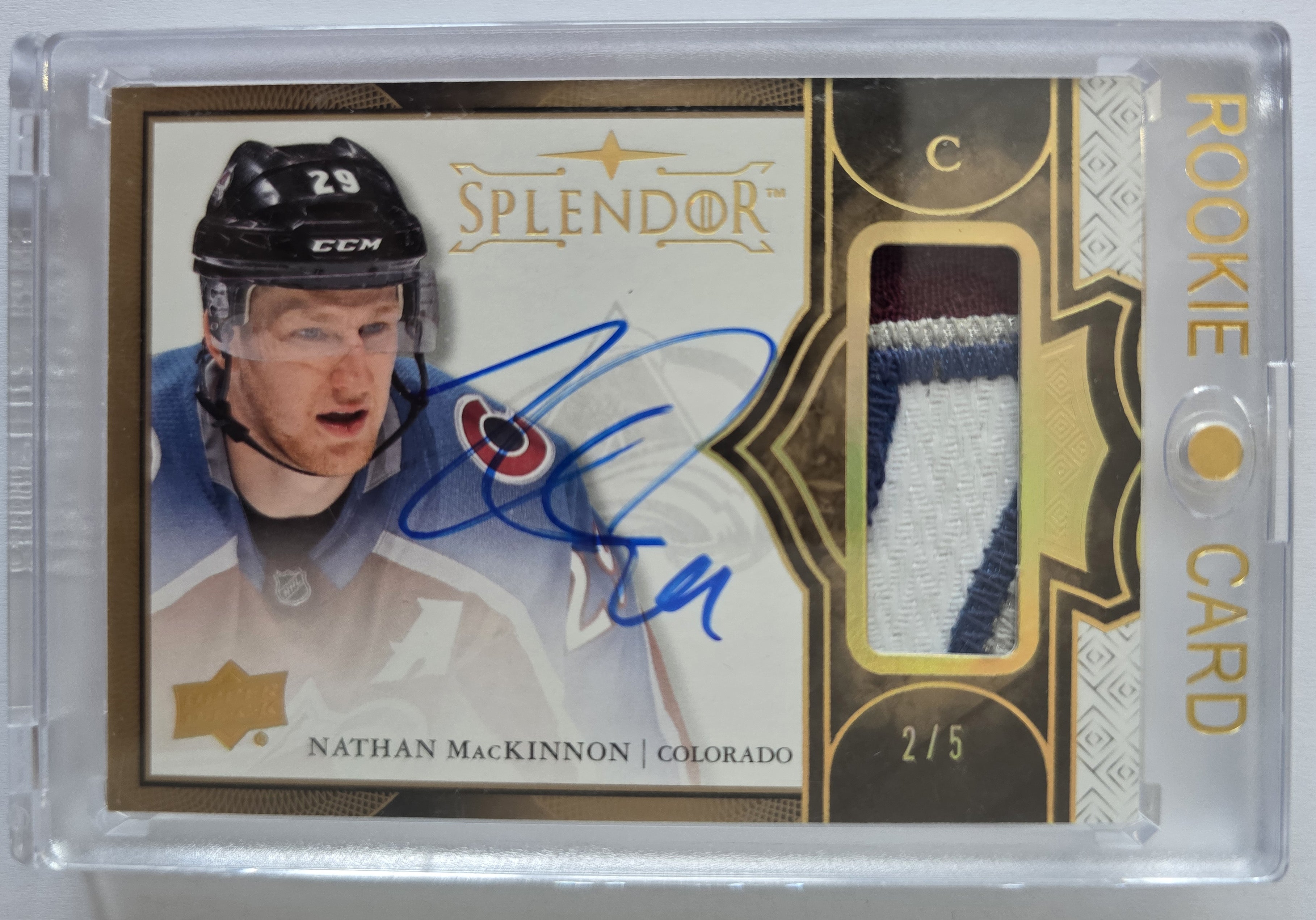 Nathan MacKinnon – 2020-21 The Cup 2017-18 Splendor Update Bordered Gold Patch Auto