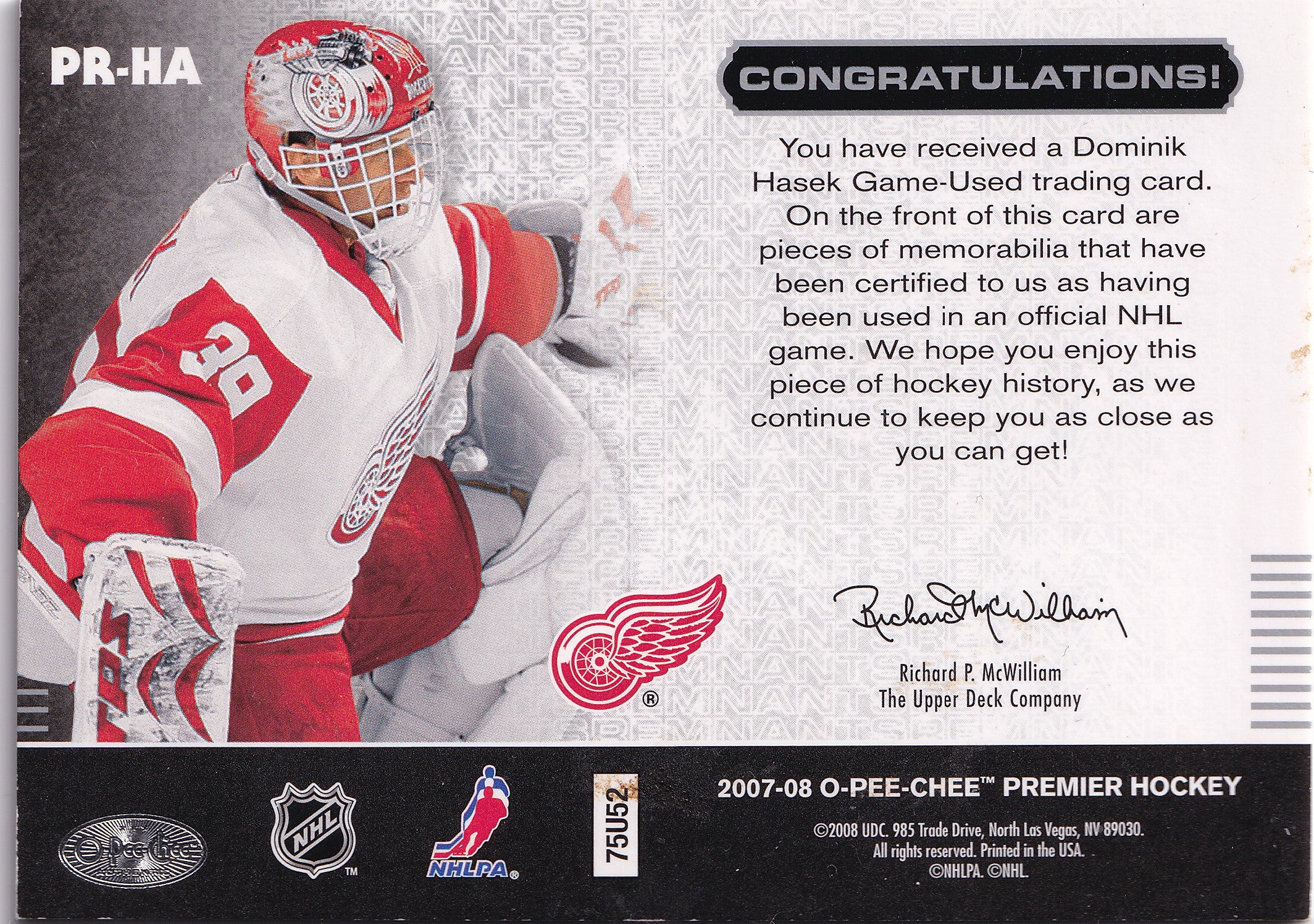 Dominik Hašek 2007–08 O-Pee-Chee Premier Remnants Triples Game-Used Jersey /100 #PR-HA – 100/100