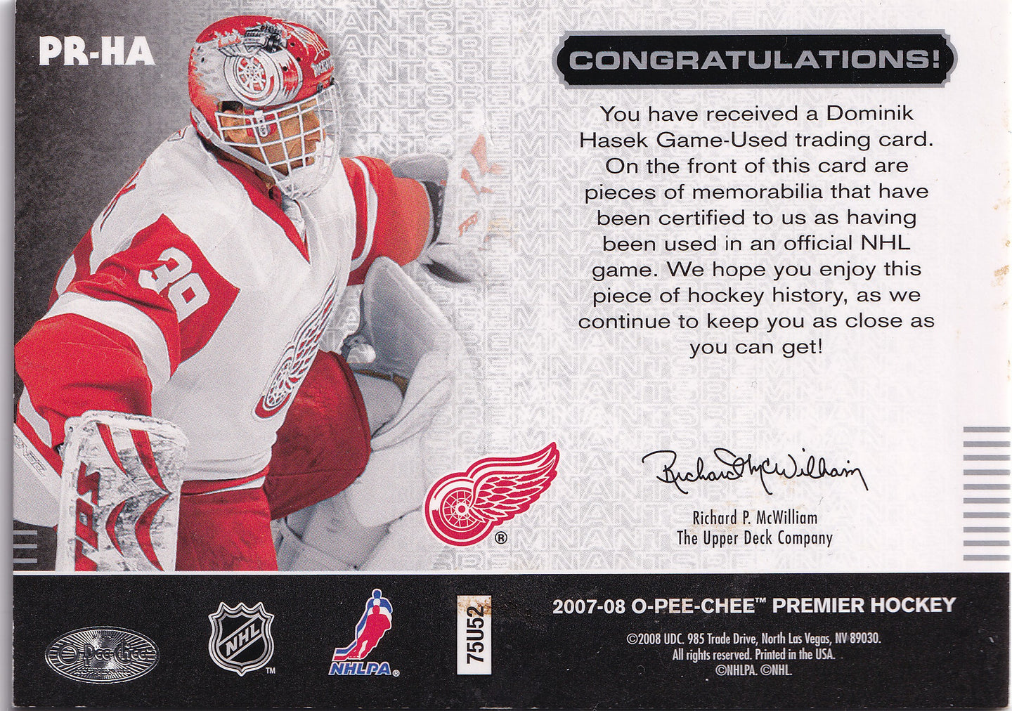 Dominik Hašek 2007–08 O-Pee-Chee Premier Remnants Triples Game-Used Jersey /100 #PR-HA – 100/100