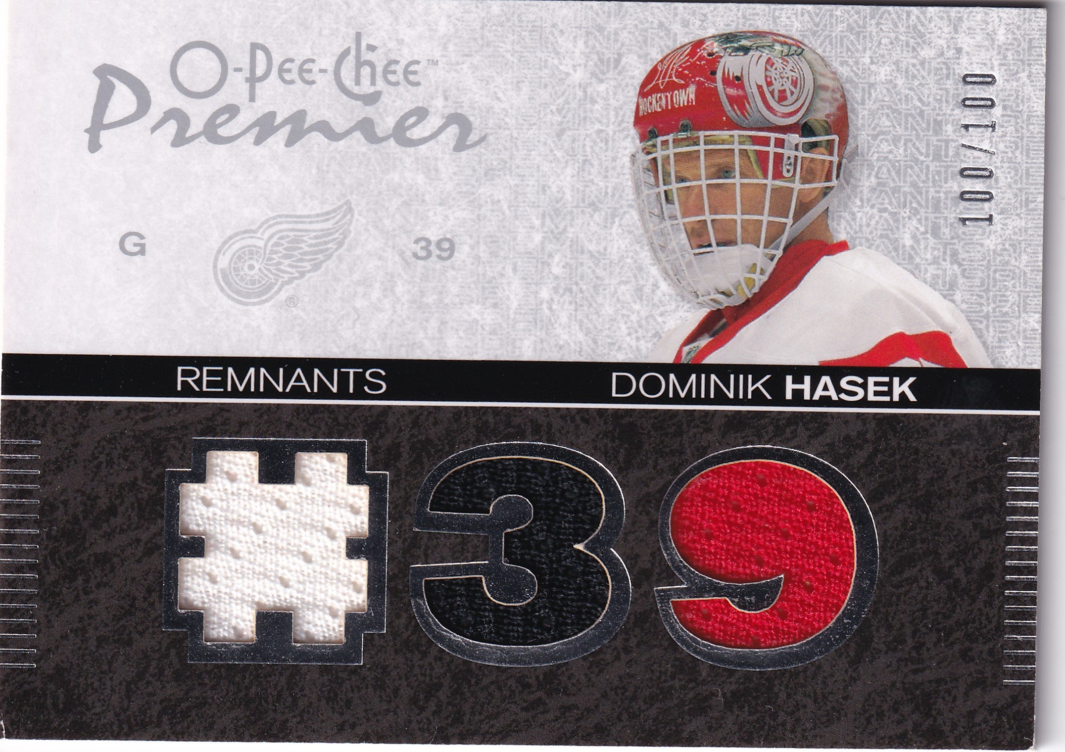 Dominik Hašek 2007–08 O-Pee-Chee Premier Remnants Triples Game-Used Jersey /100 #PR-HA – 100/100