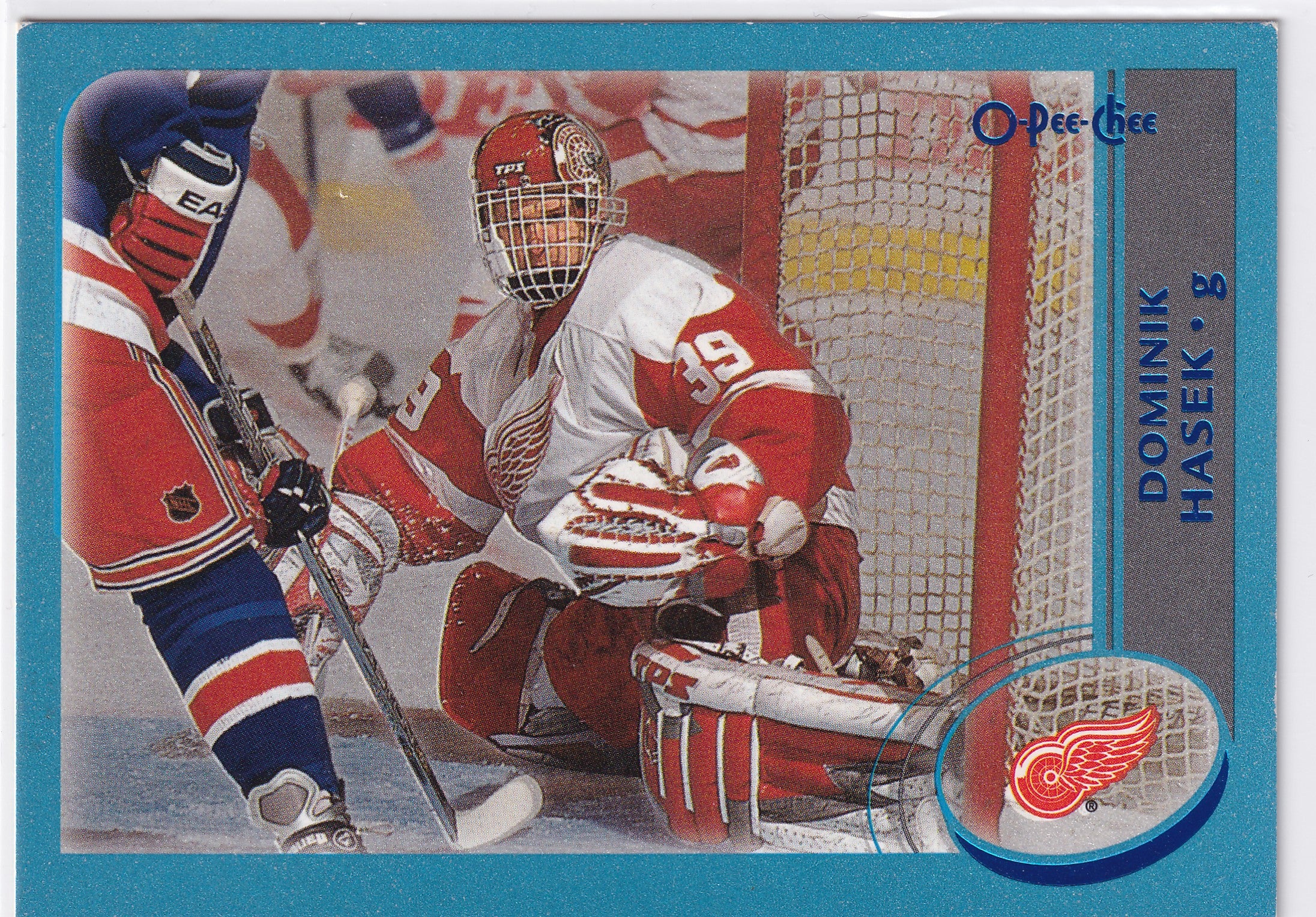 Dominik Hašek 2002–03 O-Pee-Chee Premier Blue #143 /500 – Detroit Red Wings